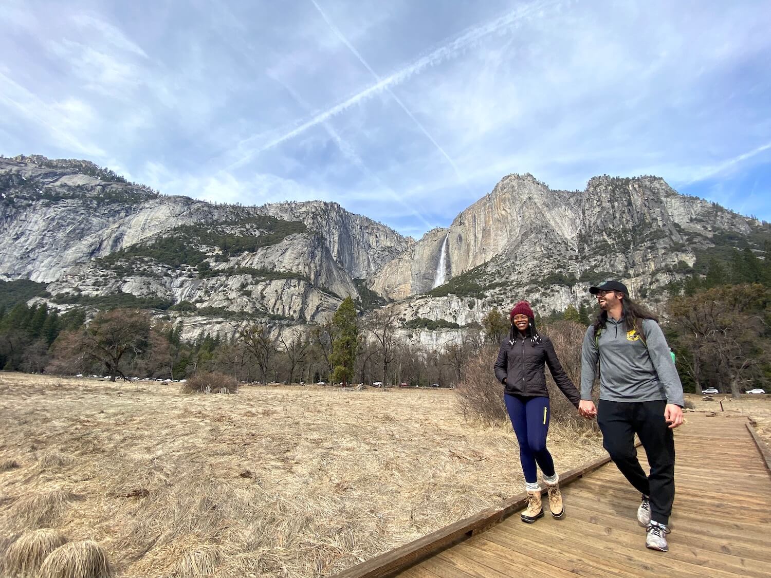 My husband and I walking in Yosemite during winter