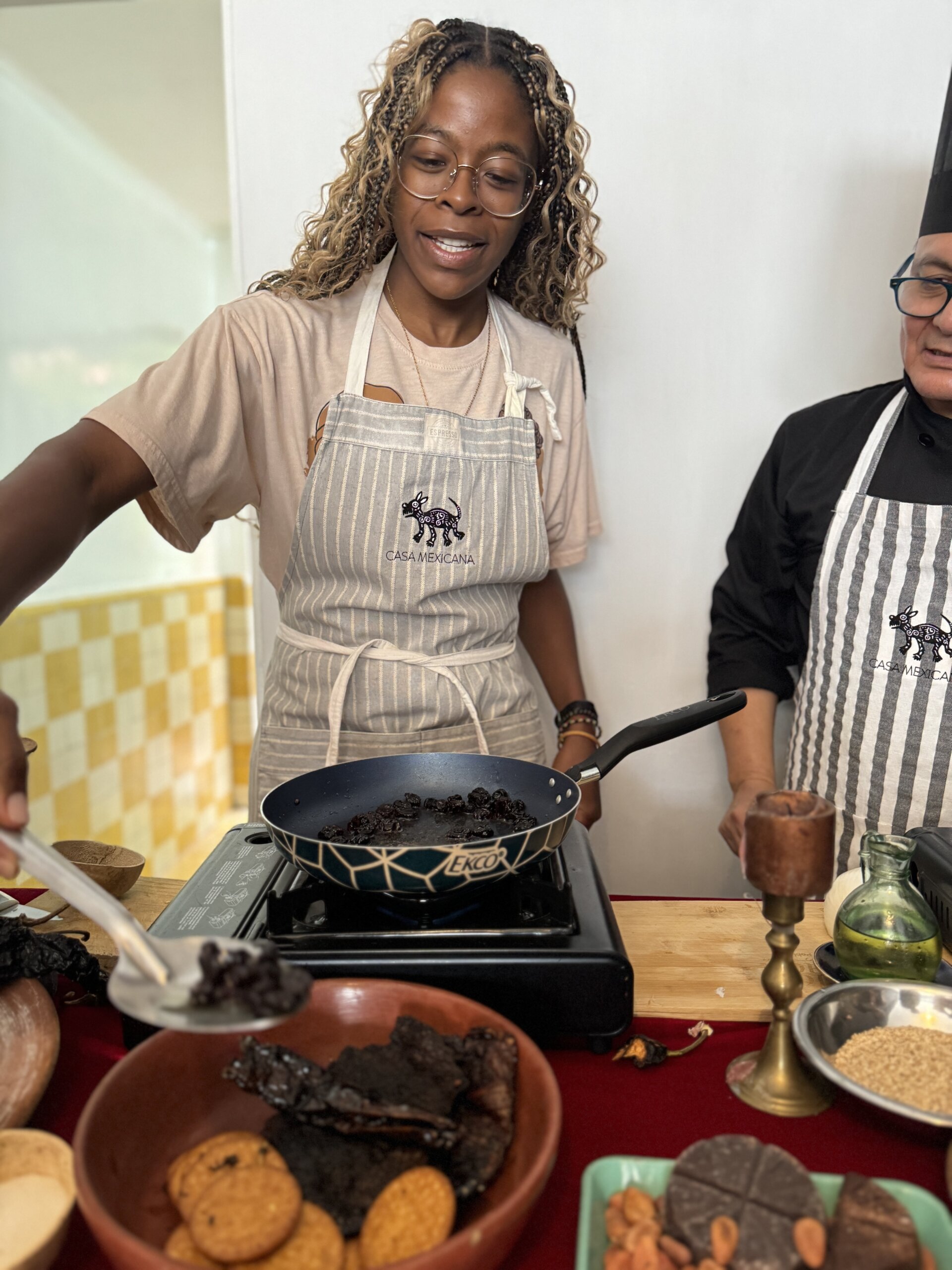 A photo of me taking a cooking class in Puebla, one of the top things to do for cultural experiences.