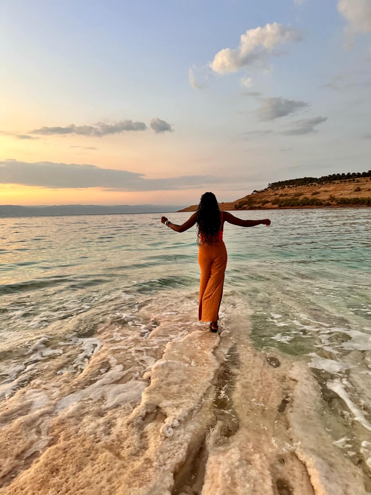 Photos of me walking on salt crystals in the Dead Sea of ​​Jordan