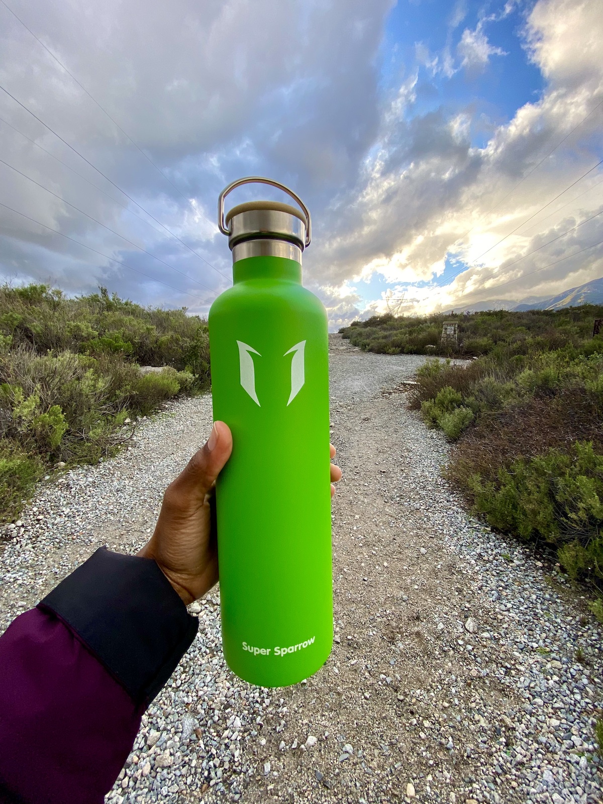 A green Super Sparrow water bottle