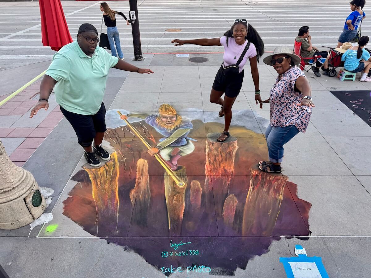 My mom, brother, and I are attending an art festival outside of LA. The art scene is big reason people love living in this state.