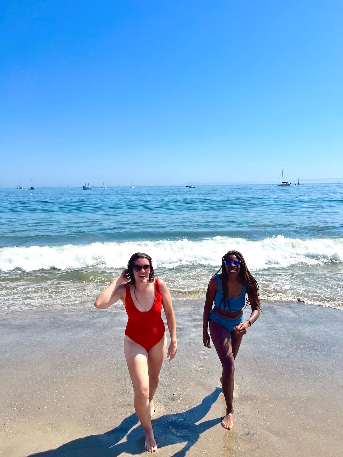 This is a photo of me enjoying the beach with a friend in Santa Barbara, a popular city in Cali.